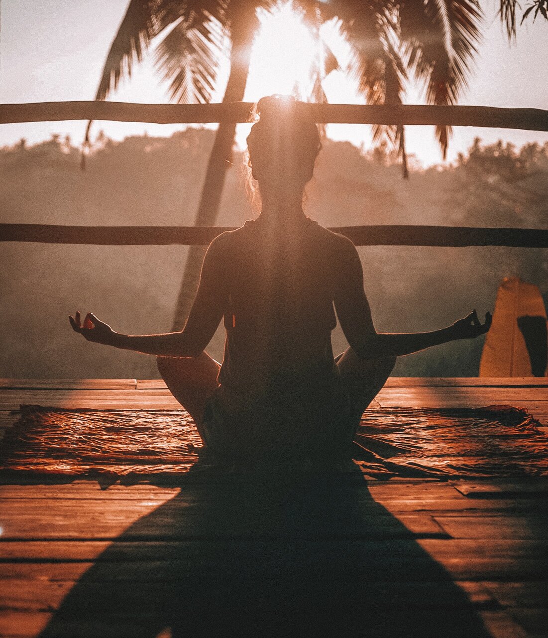 A lady meditating to improve her trading psychology